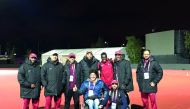 Officials of the Qatari delegation pose for a picture with young sprinter Abdalelah Haroun who won the bronze medal in the men’s 400 metres event at the IAAF Athletics World Championships in London on Tuesday. Haroun made history by becoming Asia’s first