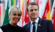 French President Emmanuel Macron and hiw wife Brigitte Macron are seen July 7, 2017 at the G20 summit in Hamburg, Germany. (File Photo / Reuters)