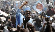 (FILES) This file photo taken on March 2, 2011 shows leading opposition presidential candidate, retired General Mohammadu Buhari raising his hand to salute the crowd shortly on arrival to flag off his presidential campaign rally in Kaduna. AFP / PIUS UTOM