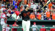 Baltimore Orioles third baseman Manny Machado (right) connects on a grand slam home run in the bottom of the 9th inning to win the game against the Los Angeles Angels in Baltimore on Friday.