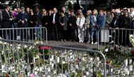 People attend a moment of silence to commemorate the victims of Friday's stabbings at the Turku Market Square in Turku, Finland August 20, 2017. / Reuters.