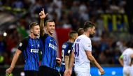 Inter Milan's Croatian forward Ivan Perisic (2L) gestures after scoring a goal during the Italian Serie A football match Inter Milan vs Fiorentina at the San Siro stadium in Milan on August 20, 2017. / AFP / MIGUEL MEDINA