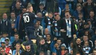 Everton's English striker Wayne Rooney celebrates scoring his team's goal during the English Premier League football match between Manchester City and Everton at the Etihad Stadium in Manchester, north west England, on August 21, 2017.   AFP / Oli SCARFF