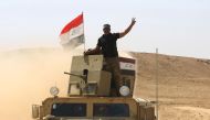 Iraqi forces, backed by Shiite fighters from the Popular Mobilization Forces, advance towards the towards the city of Tal Afar, the main remaining stronghold of the Islamic State group, after the government announced the beginning of an operation to retak