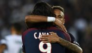 Paris Saint-Germain's Uruguayan forward Edinson Cavani (L) celebrates with Paris Saint-Germain's Brazilian forward Neymar after his second goal during the French L1 football match between Paris Saint-Germain (PSG) and Saint-Etienne (ASSE) on August 25, 20