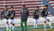 Mauricio Soria (C), the coach of Bolivia's national team, leads a training session at the Hernando Siles stadium in La Paz on August 28, 2017, ahead of Bolivia's upcoming 2018 FIFA World Cup Russia South American qualifier football matches against Peru an