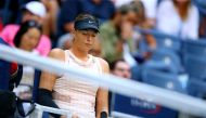 Maria Sharapova of Russia sits during of her Women's Singles round two tennis match against Timea Babos (not seen) of Hungary within 2017 US Open Tennis Championships at Arthur Ashe Stadium in New York, United States on August 30, 2017. ( Volkan Furuncu -
