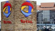 The logo of French oil giant Total is pictured at the entrance of the CSTJF Total Research Center in Pau, Soutwestern France, April 5, 2016. REUTERS/Regis Duvignau