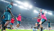 Qatar football players in action during a training session ahead of their final 2018 World Cup qualifier against China at the Khalifa International Stadium in Doha yesterday. Qatar and China will play in their Group A qualifier today at 6.00pm.  Picture: 