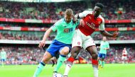Arsenal’s English striker Danny Welbeck (right) vies with Bournemouth’s English defender Simon Francis during the English Premier League match at the Emirates Stadium in London