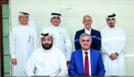Officials of Al Wa’ab City and National Industrial Contracting Company.