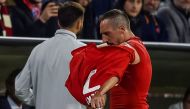 Bayern Munich's French midfielder Franck Ribery takes of his jersey after leaving the pitch during the Champions League group B match between Bayern Munich and RSC Anderlecht in Munich, southern Germany, on September 12, 2017. / AFP / GUENTER SCHIFFMANN
