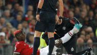 Manchester United's Paul Pogba receives medical attention after sustaining an injury REUTERS/Darren Staples
