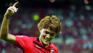 Urawa Reds forward Toshiyuki Takagi celebrates his goal during AFC Champions League quarter-final match against Kawasaki Frontale in Saitama, yesterday.