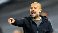 Manchester City’s Spanish manager Pep Guardiola gestures during the UEFA Champions League Group F match against Feyenoord Rotterdam at the Feyenoord Stadium in Rotterdam, on Thursday.