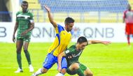 Action during the QNB Stars League match between Al Gharafa SC and Al Ahli at Al Gharafa Stadium yesterday.The match ended in a one-all draw. Picture: Kamutty VP/ The Peninsula