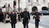Armed police officers patrol in Westminster, in London, Britain, September 16, 2017. REUTERS/Peter Nicholls