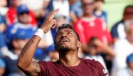 Barcelona's Paulinho celebrates scoring their second goal. (REUTERS/Paul Hanna)