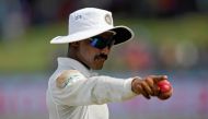 India's Ravindra Jadeja shows a ball as he gestures at fans. REUTERS/Dinuka Liyanawatte/file photo
