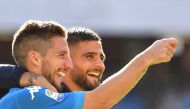 Napoli's Belgian striker Dries Mertens (L) celebrates with Napoli's Italian striker Lorenzo Insigne at the end of the Italian Serie A football match Napoli vs Benevento on September 17, 2017 at San Paolo stadium in Naples. / AFP / ALBERTO PIZZOLI
