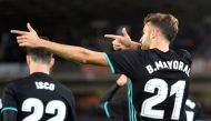 Real Madrid's forward from Spain Borja Mayoral celebrates after scoring his team's first goal during the Spanish league football match Real Sociedad vs Real Madrid CF at the Anoeta stadium in San Sebastian on September 17, 2017. / AFP / ANDER GILLENEA
