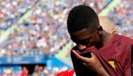 Barcelona's record signing Ousmane Dembele reacts as he leaves the pitch after sustaining an injured during his Spanish La Liga match against Getafe at Colisseum Alfonso Perez stadium in Getafe, Spain, September 16, 2017. Picture taken September 16, 2017.