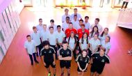 Michael Beale, the newly appointed Foundation Phase coach at Liverpool FC and Little League Sports’ (LLS) Ambassador,   poses for a photograph with students and officials of Doha College and Evolution Sports.
