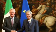 European Union's chief Brexit negotiator Michel Barnier (L) shakes hand with Italy's Prime Minister Paolo Gentiloni during a meeting in Rome, Italy September 21, 2017. Reuters/Alessandro Bianchi