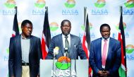 Kenyan opposition leader Raila Odinga (centre), the presidential candidate of the National Super Alliance coalition, and his running-mate Kalonzo Musyoka (right) and Moses Wetangula attend a press conference in Nairobi, yesterday.
