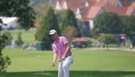 Justin Thomas chips up onto the 6th green during the second round of the Tour Championship golf tournament at East Lake Golf Club. Butch Dill
