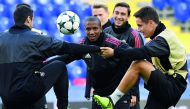 Manchester United’s midfielders Henrikh Mkhitaryan,  Ashley Young and Ander Herrera take part in a training session at the Stadion CSKA Moskva in Moscow yesterday on the eve of the UEFA Champions League Group A football match against PFC CSKA Moskva.