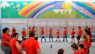 A batucada group play drums with children inside a school at the Gracia neighbourhood in Barcelona on September 30, 2017. Supporters of an independence referendum in Catalonia opposed by Madrid occupied would-be polling stations yesterday in a bid to ensu