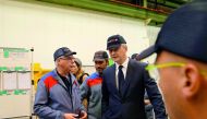 French Finance Minister Bruno Le Maire (C) talks with employees during a visit at the Alstom plant in Petite-Foret near Valenciennes, France, September 29, 2017. REUTERS/Pascal Rossignol