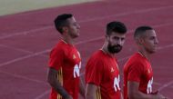 Spain's players Gerard Pique, Rodrigo Moreno and Thiago Alcantara arrive at a training session in Las Rozas, near Madrid, Spain, October 2, 2017. REUTERS/Rafael Marchante
