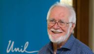 One of the three winners of the 2017 Nobel Prize in Chemistry, Swiss Scientist Jacques Dubochet smiles during a press conference at the Lausanne University following the prize's announcement on October 4, 2017. AFP / Fabrice COFFRINI
