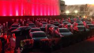 Tesla Model 3 cars wait for their new owners as they come off the Fremont factory’s production line during an event at the company’s facilities in Fremont, California.