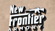 A general view shows a sign outside the New Frontier Armory on October 4, 2017 in North Las Vegas, Nevada. Stephen Paddock legally bought firearms at the store earlier this year. On October 1, Paddock killed at least 59 people and injured more than 500 af