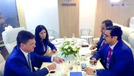 H E Dr Mohammed bin Saleh Al Sada (right), Minister of Energy and Industry, discussing bilateral cooperation with his Russian counterpart Alexander Novak in Moscow.