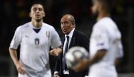 Italy's coach Gian Piero Ventura (C) looks on during the FIFA World Cup 2018 qualification football match between Italy and Macedonia at The 'Grande Torino Stadium' in Turin on October 6, 2017. / AFP / MARCO BERTORELLO