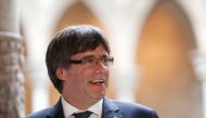 Catalan President Carles Puigdemont meets with members of the Independent Comission for Mediation and Dialogue, at the Palau de la Generalitat, the regional government headquarters in Barcelona, Spain, October 6, 2017. REUTERS/Yves Herman
