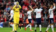  Tottenham's Christian Eriksen, Hugo Lloris and Harry Winks applaud the fans at the end of the match as Davinson Sanchez celebrates REUTERS/Dylan Martinez