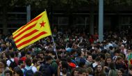 Students wave an Estelada (Catalan separatist flag) during a gathering to protest against the imprisonment of leaders of two of the largest Catalan separatist organizations, Catalan National Assembly's Jordi Sanchez and Omnium's Jordi Cuixart, who were ja