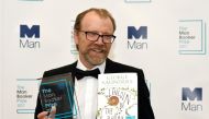 George Saunders, author of 'Lincoln in the Bardo', poses for photographers after winning the Man Booker Prize for Fiction 2017 in London, Britain, October 17, 2017. Reuters/Mary Turner