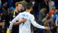 Tottenham Hotspur's English striker Harry Kane (L) greets Real Madrid's Portuguese forward Cristiano Ronaldo after the UEFA Champions League group H football match Real Madrid CF vs Tottenham Hotspur FC at the Santiago Bernabeu stadium in Madrid on Octobe