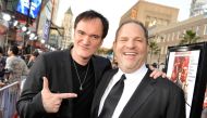 This file photo taken on August 10, 2009 shows director Quentin Tarantino (L) and producer Harvey Weinstein arriving at the premiere of Weinstein Co.'s 