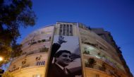 A poster of Lebanese assassinated president-elect Bashir Gemayel, is seen flanked on a building in Beirut,Lebanon October 20,2017.REUTERS/ Mohamed Azakir
