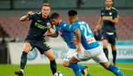 Napoli's Belgian striker Dries Mertens (2nd-L) fights for the ball with Inter Milan's Slovak defender Milan Skriniar (1st-L) during the Italian Serie A football match SSC Napoli vs FC Internazionale Milano on October 21 2017 at the San Paolo Stadium. / AF