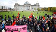 Protesters demonstrate against the anti-immigration party Alternative for Germany (AfD) becoming part of the German lower house of parliament Bundestag for the first time, in Berlin, Germany October 22, 2017. REUTERS/Axel Schmidt