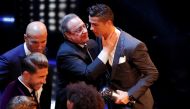  Real Madrid’s Cristiano Ronaldo speaks with Real Madrid president Florentino Perez after winning The Best FIFA Men’s Player Award as coach Zinedine Zidane and teammates Sergio Ramos and Marcelo look on Action Images via Reuters/John Sibley