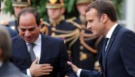 French President Emmanuel Macron greets Egyptian President Abdel Fattah al-Sisi as he leaves the Elysee palace, in Paris, France, October 24, 2017. Reuters/Philippe Wojazer
